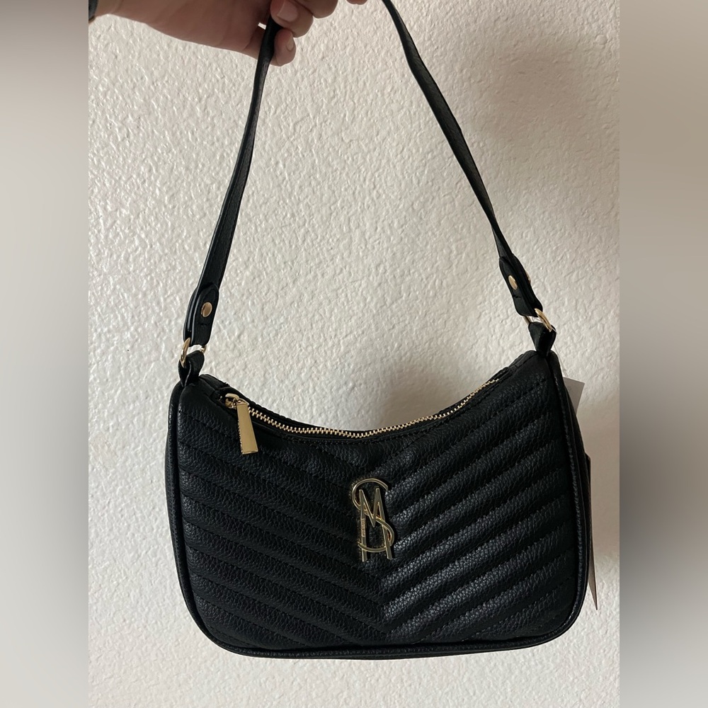 Brand new Steve Madden purse with tags !